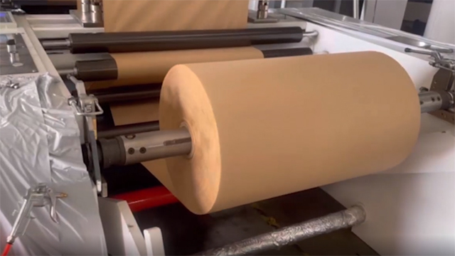 Machine de fabrication de sacs en papier à fond plat (sac SOS à poignées découpées)